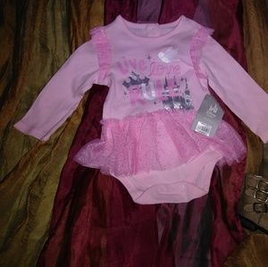 Disney pink long sleeve onesie with tan boots
